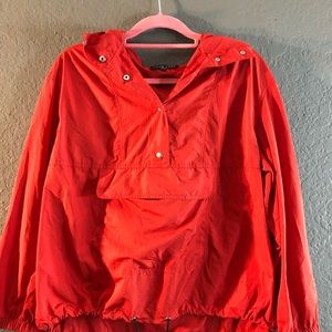 red windbreaker